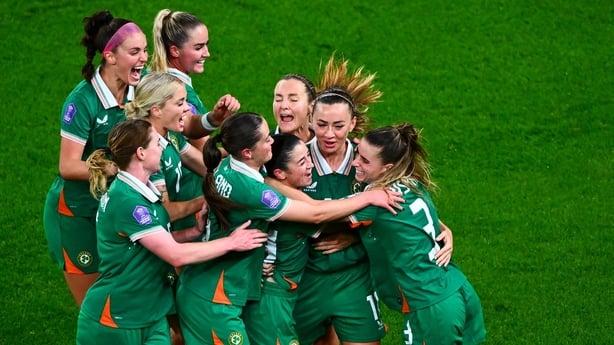 Marissa Sheva of Republic of Ireland, centre, is congratulate by teammates after scoring their side's fourth goal during the UEFA Women's Nations League A/B promotion/relegation play-off first leg match between Republic of Ireland and Belgium at the Aviva Stadium in Dublin. 