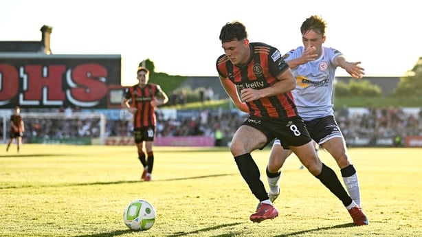 16 May 2025; Dayle Rooney of Bohemians in action against James Norris of Shelbourne during the SSE Airtricity Men's Premier Division match between Bohemians and Shelbourne at Dalymount Park in Dublin. Photo by Seb Daly/Sportsfile