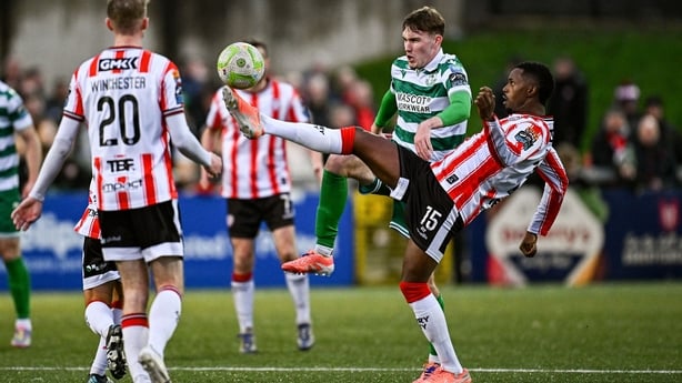 26 October 2025; Sadou Diallo of Derry City in action against Matt Healy of Shamrock Rovers during the SSE Airtricity Men's Premier Division match between Derry City and Shamrock Rovers at The Ryan McBride Brandywell Stadium in Derry. Photo by Seb Daly/Sportsfile