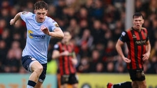 26 October 2025; John Martin of Shelbourne on his way to scoring his side's first goal during the SSE Airtricity Men's Premier Division match between Bohemians and Shelbourne at Dalymount Park in Dublin. Photo by Thomas Flinkow/Sportsfile