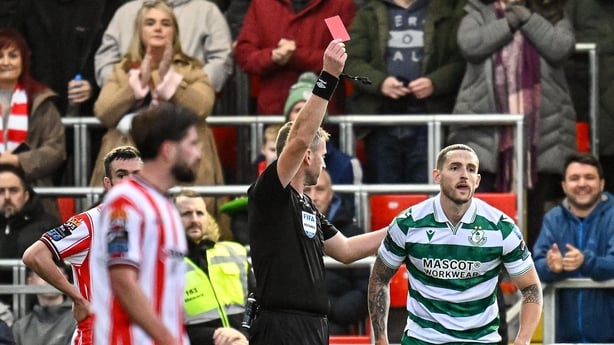 26 October 2025; Lee Grace of Shamrock Rovers is sent off by referee Paul McLaughlin during the SSE Airtricity Men's Premier Division match between Derry City and Shamrock Rovers at The Ryan McBride Brandywell Stadium in Derry. Photo by Seb Daly/Sportsfile