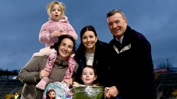 26 October 2025; St Finbarr's coach Jimmy Barry Murphy celebrates his side's victory with his daughters, Ann, left, Orla, and granddaughters Saoirse, left and Elizabeth after the Cork County Senior Club Football Championship final match between Nemo Rangers and St Finbarr's at SuperValu Pairc Ui Cha